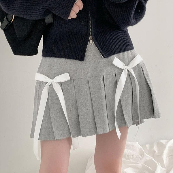 Minifalda plisada de tiro alto con lazo en contraste y corte A 